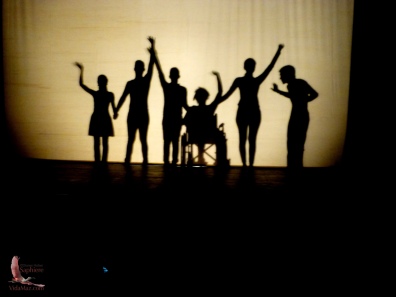 Dance performance conducted in silouette