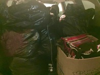 A few of the dozens of bagfuls of clothing, shoes, and linens we've received